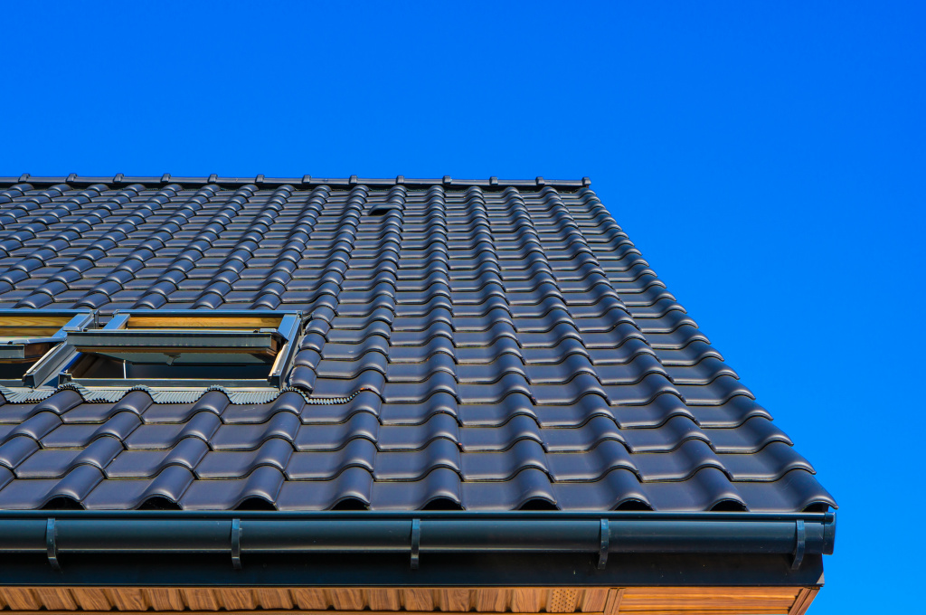 vertical-low-angle-closeup-shot-of-the-black-roof-of-a-building.jpg